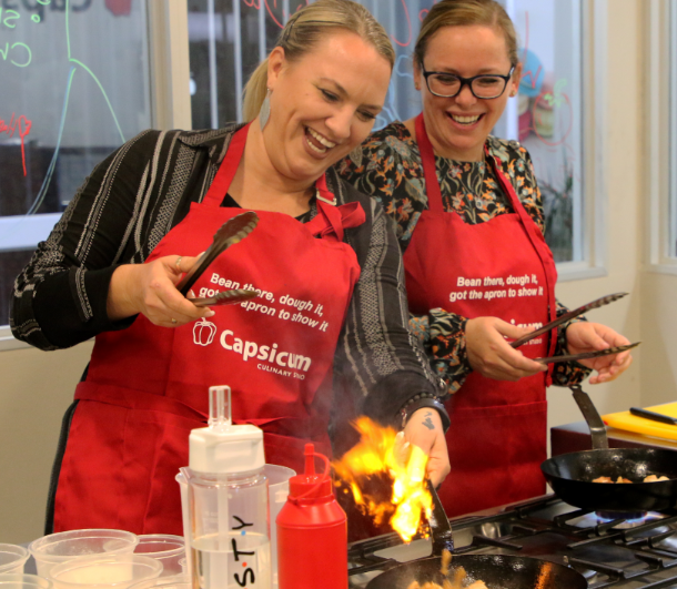 Kirsty Reilly and Jacqui Jordaan enjoy themselves at The Herald Cooking Masterclass