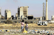 BLEAK FUTURE: A girl plays at the informal settlement near the Marikana mine in North West. The massacre there is the kind of reality that Trevor Manuel's National Development Plan does not acknowledge or address Picture: ANTONIO MUCHAVE