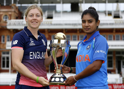 Heather Knight of England (L) and Mithali Raj of India pose with the trophy before The Women's World Cup 2017 final between England and India at Lord's Cricket Ground on July 22, 2017 in London, England. (Photo by IDI/IDI via Getty Images)