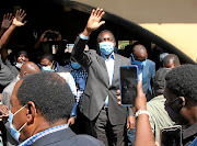 President-elect  Hakainde Hichilema of Zambia acknowledges supporters. 