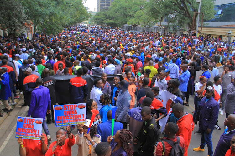 A group of Nyamakima traders demonstrate in CBD against invasion of Chinese investors in February 28 2023.