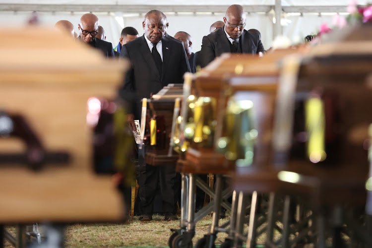 Presiident Cyril Ramaphosa and Eastern Cape premier Oscar Mabuyane at the mass funeral of 19 of the 21 youngsters who died in the Enyobeni tavern tragedy at the Scenery Park sport ground on Wednesday.