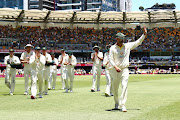 Nathan Lyon of Australia thanks the crowd at the lunch break after taking four wickets on day four of the First Test in the Ashes series against England at the Gabba  in Brisbane on December 11 2021.