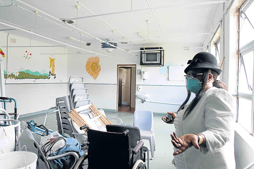 DESERTED: Fort Grey’s senior executive manager Nonceba Nqini at one of the already evacuated female wards Picture: SIBONGILE NGALWA