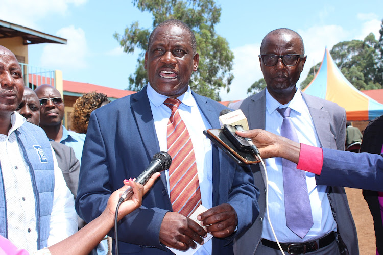 Karega Day Secondary School principal Muiga Njuguna addresses journalists on January 9, 2024.