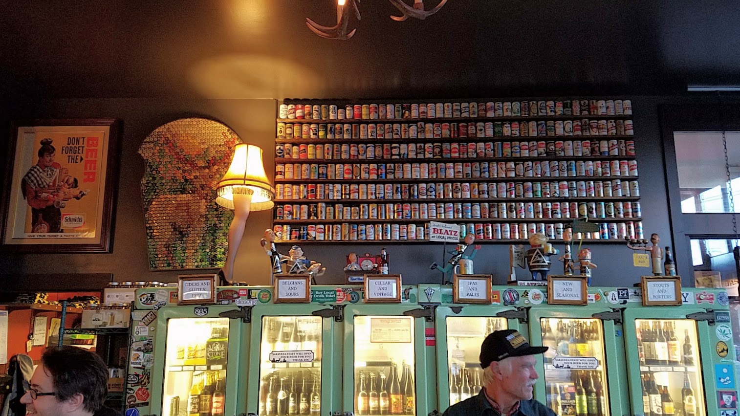 When you walk through that door of Saraveza, you immediately feel a bit like you're in a beer museum with all the retro beer paraphernalia all along the walls and the brightly lit coolers of their literally hundreds of beer by the bottle in addition to their 10 rotating taps