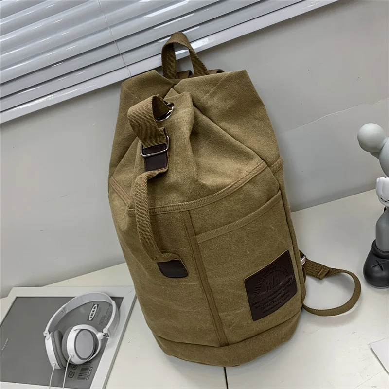 Mochila esportiva com tubo de água, bolsa escolar de lona moderna, perfeita para estudantes, design estiloso e funcional, ideal para atividades.