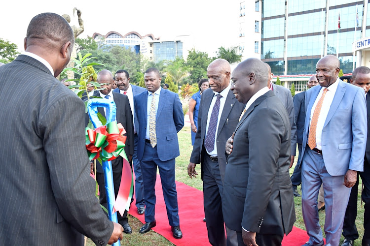 Deputy President Rigathi Gachagua with other leaders at Kenyatta University during the 52nd graduation ceremony.