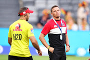 Lions coach Ivan van Rooyen watches on during the warm-up before the round five Super Rugby match between the Waratahs and the Lions at Bankwest Stadium on February 28, 2020 in Sydney, Australia. 