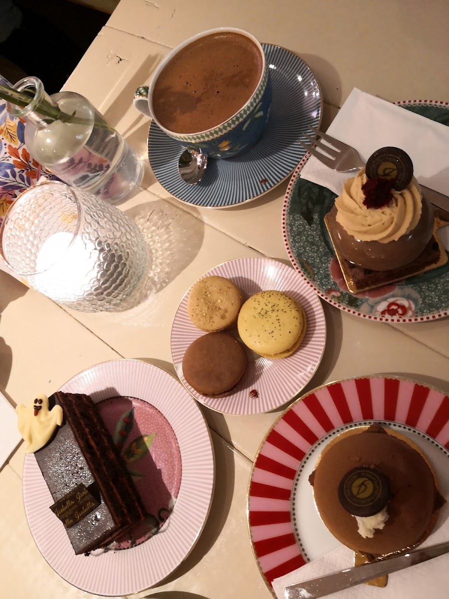 hot chocolate, cake and macarons