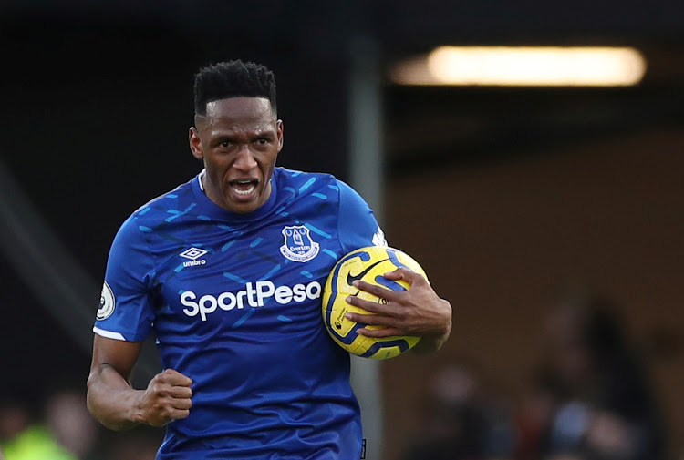 Everton's Yerry Mina celebrates scoring their first goal against Watford on February 1, 2020.