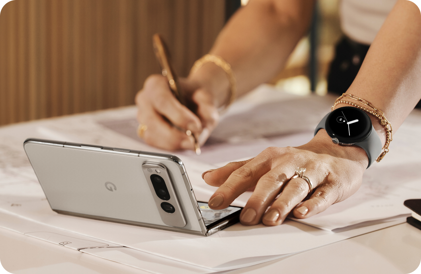 A woman working on her Google Pixel Fold.