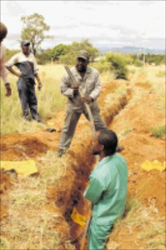 MENDING: Polokwane council workers fixing electricity cables after thieves struck. Pic: CHESTER MAKANA. Circa February 2010. © Sowetan