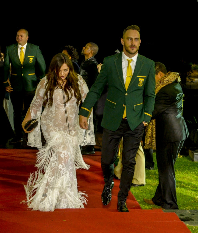 Faf du Plessis and partner, Imari, arriving during the CSA Awards 2017 at Theatre on the Track at Kyalami Race Track on May 13, 2017 in Johannesburg, South Africa.