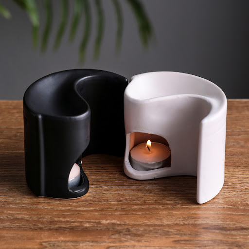 Title 4, Black and white ceramic aromatherapy stove. Dif...