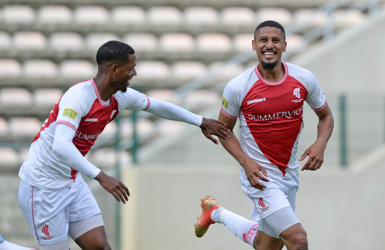 Cape Town Spurs player Therlo Moosa (right) celebrates his goal during the Motsepe Foundation Championship match against Platinum City Rovers at Athlone Stadium on 21 April 2023.