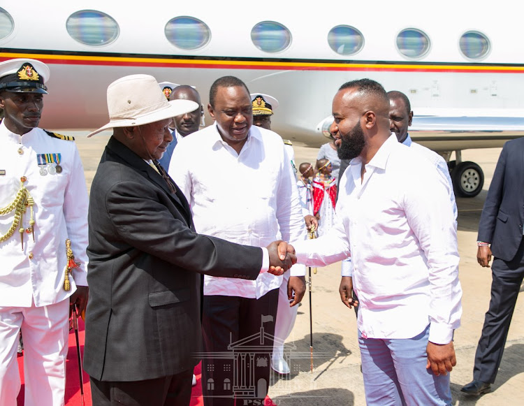 Ugandan President Yoweri Museveni is welcomed by President Uhuru Kenyatta and Mombasa Governor Hassan Joho at the Moi International Airport in Mombasa on Wednesday, March 27, 2019.