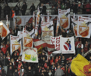 Les supporters montois envahissent le terrain après le match contre Tubize