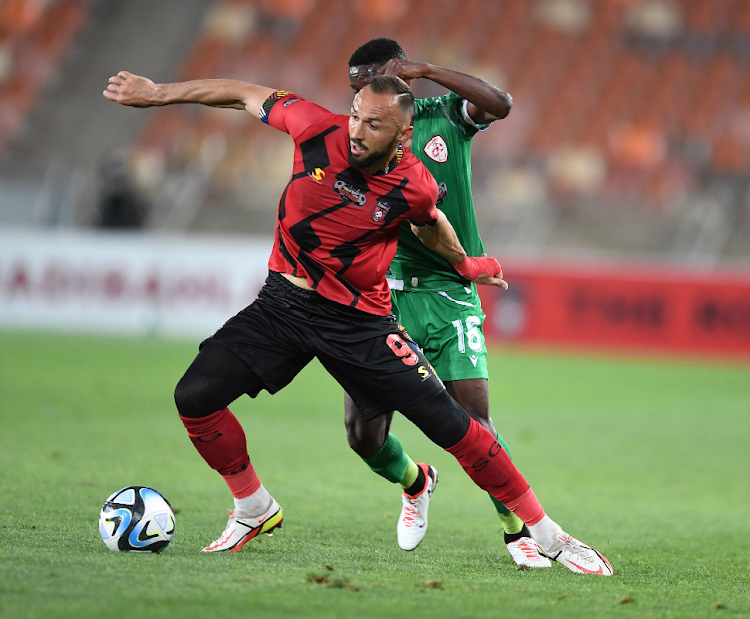 TS Galaxy FC striker Samir Nurkovic and Rally Bwalya of Sekhukhune United during the Carling Knockout quarterfinal match at Peter Mokaba Stadium on November 04, 2023.