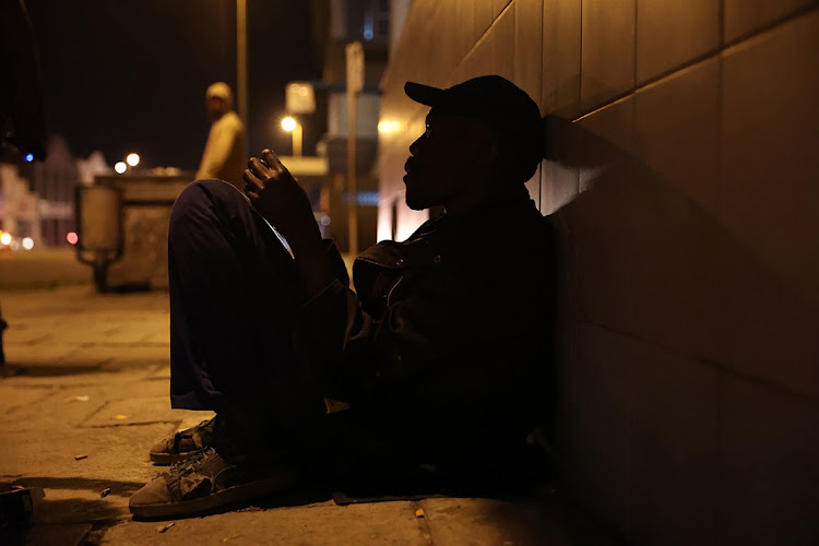 Homeless people, like this man on Cambridge Street in East London's CBD, have to contend with conditions which derail their dreams and access to social securities.