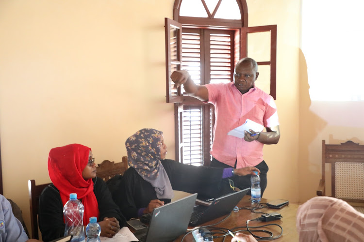 KPA officials train clerks who will undertake the verification of the beneficiary fishermen.