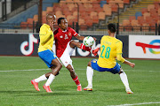 Percy Tau of Al Ahly attempts to control possession during the CAF Champions League match between Al Ahly and Mamelodi Sundowns held at the Cairo International Stadium in Cairo, Egypt on 26 February.