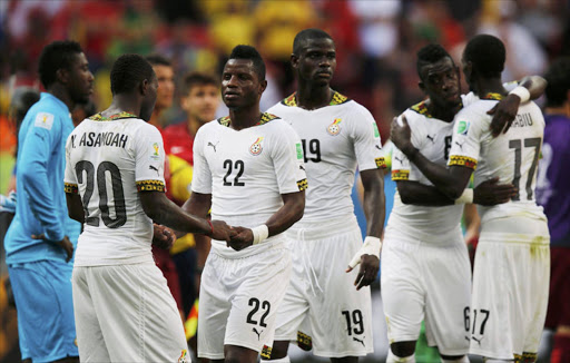 Ghana's players react after losing over Portugal during their 2014 World Cup Group G soccer match at the Brasilia national stadium in Brasilia. Photo: Reuters