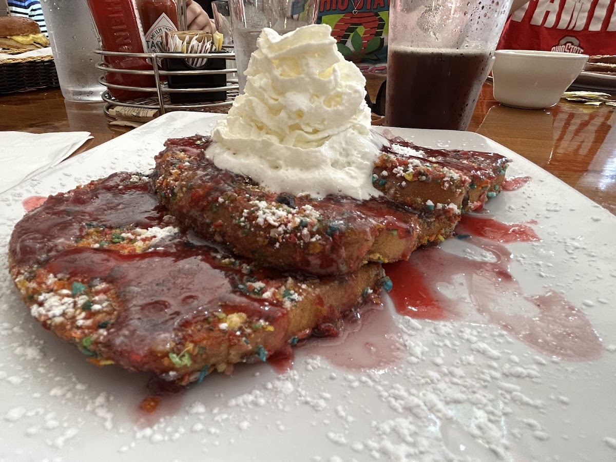 GF Rockin Rainbow Road french toast- coated in fruity pebbles with a raspberry sauce