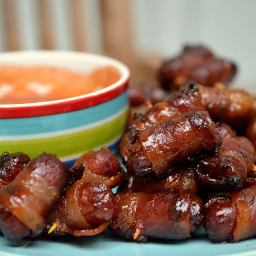 Bacon-Wrapped Little Smokies are the perfect easy appetizer recipe for game day and holiday parties.  They are quick to prepare, dependable, and easy on the pocketbook.