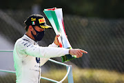 Race winner Pierre Gasly of France and Scuderia AlphaTauri celebrates on the podium during the F1 Grand Prix of Italy at Autodromo di Monza on September 6 2020 in Monza.