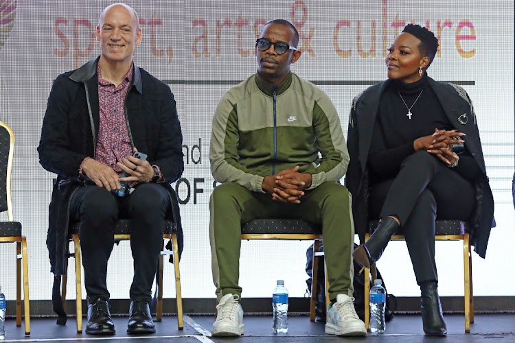 Wouter Kellerman, Zakes Bantwini and Nomcebo Zikode at a welcoming ceremony at OR Tambo International Airport after their Grammy win.