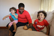 Princess Thembani speaks only Xhosa to Declan, 3, and 15-month-old Madison