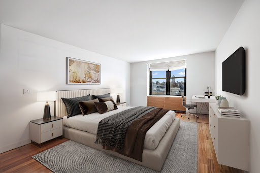Bedroom with bed, desk, and television - Apartment / penthouse purchase in New York, 2 rooms, 1 bedroom