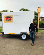 Kwanele Mbatha with his mobile kitchen that has gone missing. 