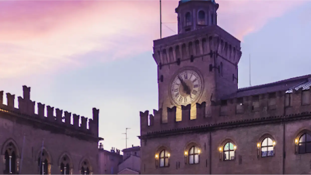 Comune di Bologna building and sunset background