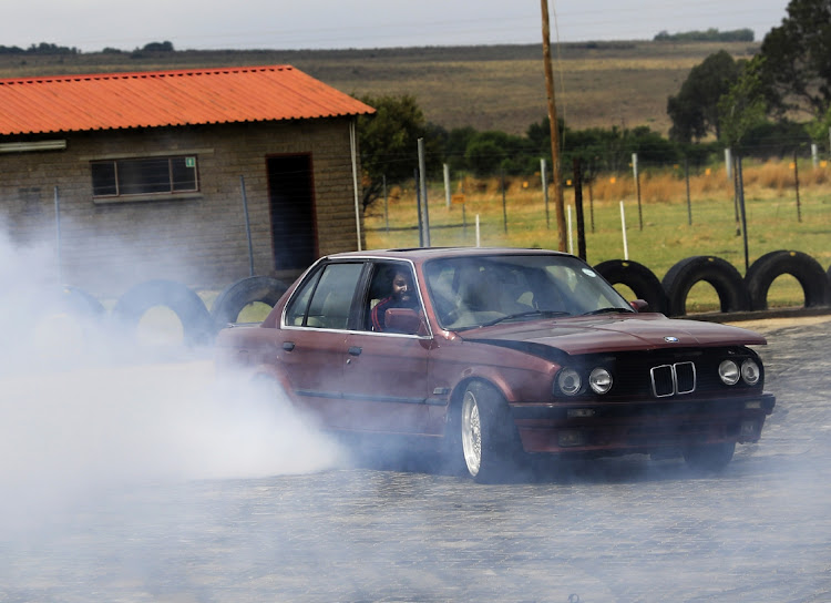 Big Zulu in the modified BMW that is de rigeur for spinning in these circles.