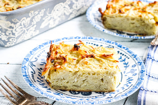 A slice of Potato Kugel on a plate.