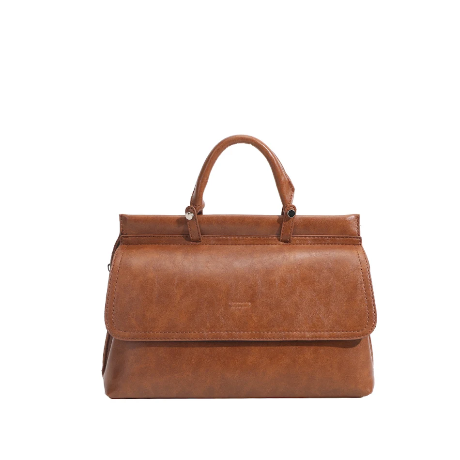 Sac à main rétro style européen et américain, sac messager porté épaule. Tote bag spacieux et élégant pour un look intemporel.
