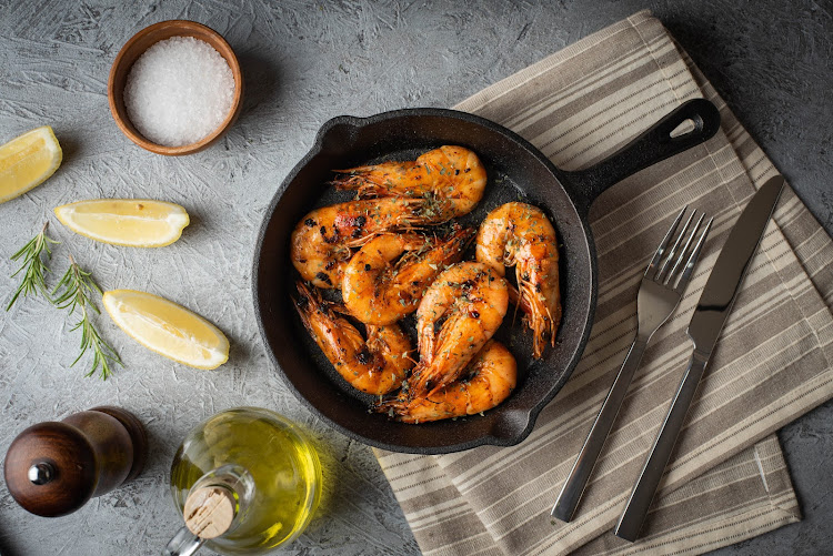 Indulge in peri-peri prawns at Os Tios Restaurant and Sky Lounge. File image.