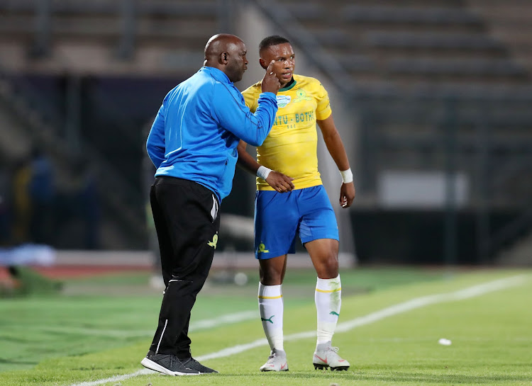 Mamelodi Sundowns coach Pitso Mosimane gives instructions to midfielder Andile Jali during the Telkom Knockout Cup match against Bloemfontein Celtic at the Lucas Moripe Stadium in Atteridgeville on October 20, 2018.