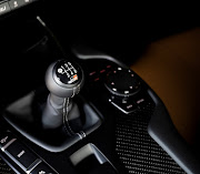 The row your own GR Supra sports a redesigned centre console; a modification necessary to house the manual shifter. 