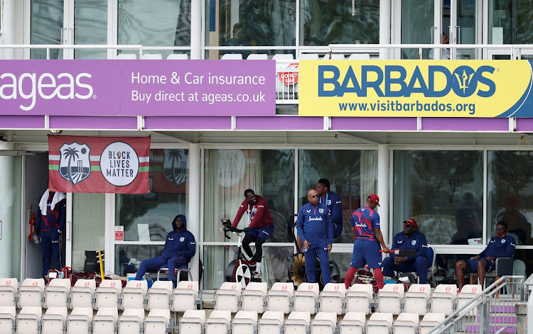 West Indies players and staff in the stands outside the dressing room as rain delayed the start of the first Test in Southampton on July 8 2020.