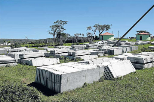 FLUSHED PLANS: Concrete slabs that were part of the initial Amathole project, lie unused in Madliki village earlier this year Picture: ALAN EASON