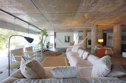 Modern living room with hammocks and white sofas - Luxury house for sale in Angra dos Reis, 5 bedrooms