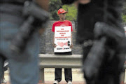 TAKING A STAND: People protest as part of the Right2Know campaign against the Secrecy Bill at the Hector Pieterson Memorial in Soweto. PHOTO : ANTONIO MUCHAVE