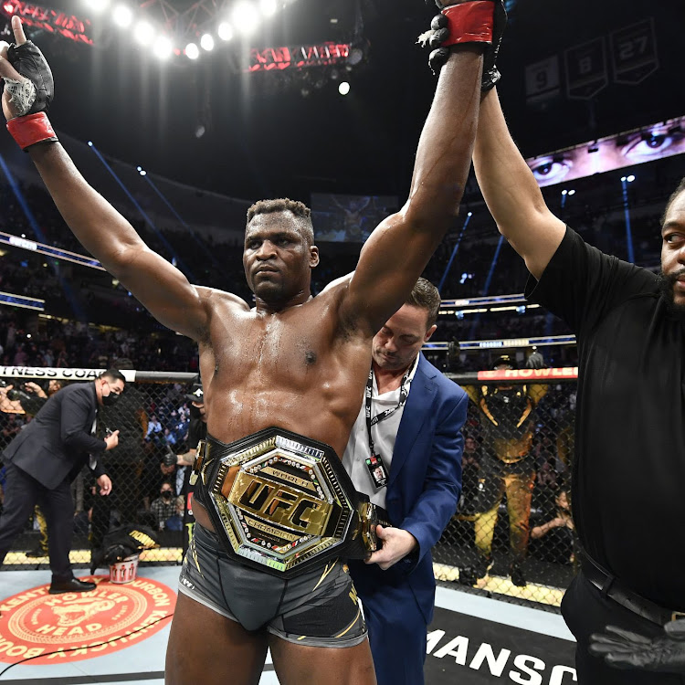 Francis Ngannou celebrates after winning a past UFC bout