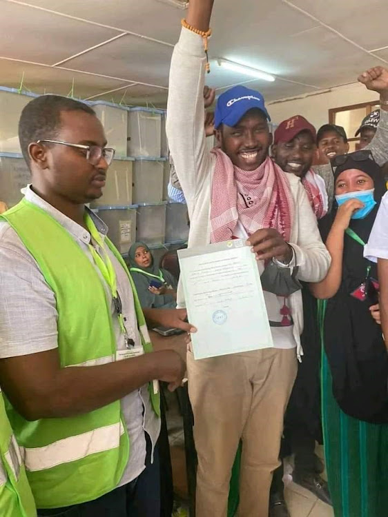 Fafi MP-elect Salah Yakub is issued with IEBC certificate at Bura tallying centre on Thursday last week.