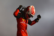 Race winner Charles Leclerc celebrates in parc ferme during the F1 Grand Prix of Bahrain at Bahrain International Circuit on March 20 2022 in Bahrain.