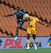 Mashweu Mphahlele of Swallows challenges Christian Saile of
Chiefs on Saturday. 