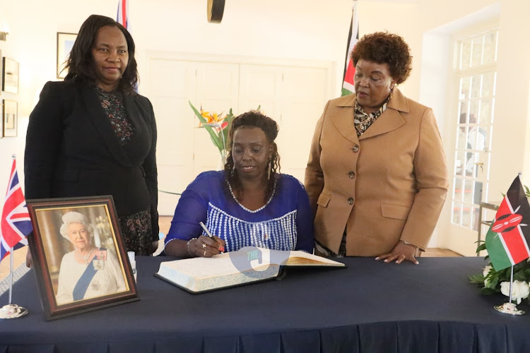 Machakos Woman Representative Joyce Kamene signs the late Queen Elizabeth's condolences book at the British High Commission in Nairobi on Monday, September 12, 2022.